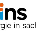 Ein einselmännchen im Logo von eins energie in sachsen.